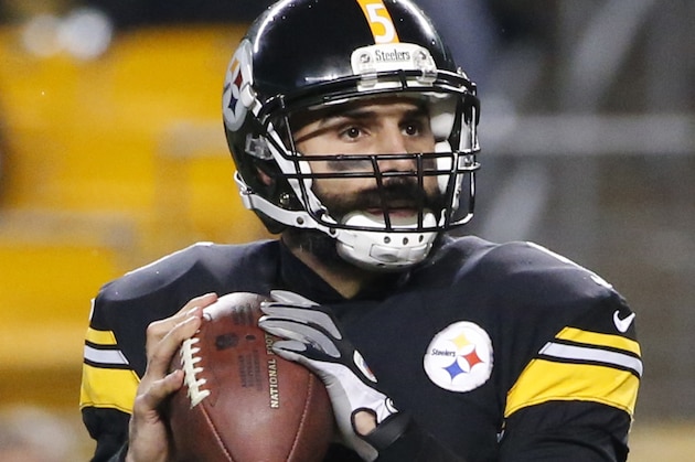 Pittsburgh Steelers quarterback Bruce Gradkowski (5) passes after starter Ben Roethislberger was shaken up on a sack during the fourth quarter of an NFL wildcard playoff football game against the Baltimore Ravens, Saturday, Jan. 3, 2015, in Pittsburgh. Roethlisberger re-entered the game after three plays. The Steelers lost, 30-17. (AP Photo/Gene J. Puskar)