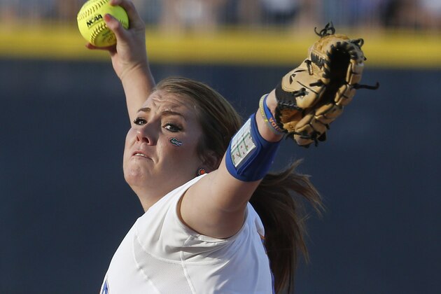 Florida's Lauren Haeger pitches in the first inning of an NCAA Women's College World Series softball tournament game against Alabama in Oklahoma City, Tuesday, June 3, 2014. (AP Photo/Sue Ogrocki)