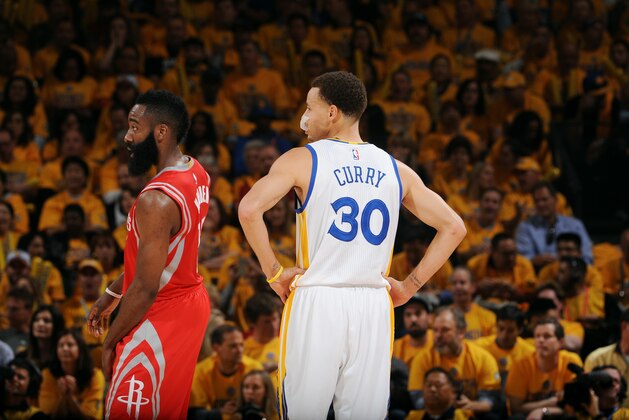 OAKLAND, CA - MAY 21: James Harden #13 of the Houston Rockets stands on the court during a game against Stephen Curry #30 of the Golden State Warriors in Game Two of the Western Conference Finals of the 2015 NBA Playoffs on May 21, 2015 at Oracle Arena in Oakland, California. NOTE TO USER: User expressly acknowledges and agrees that, by downloading and or using this photograph, user is consenting to the terms and conditions of Getty Images License Agreement. Mandatory Copyright Notice: Copyright 2015 NBAE (Photo by Noah Graham/NBAE via Getty Images)