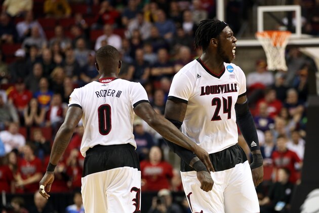 SEATTLE, WA - MARCH 22:  Terry Rozier #0 of the Louisville Cardinals reacts with teammate Montrezl Harrell #24 in the second half of the game against the Northern Iowa Panthers during the third round of the 2015 NCAA Men's Basketball Tournament at KeyArena on March 22, 2015 in Seattle, Washington.  (Photo by Otto Greule Jr/Getty Images)