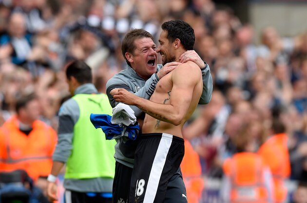NEWCASTLE UPON TYNE, ENGLAND - MAY 24:  Newcastle coach John Carver (l) congratulates Jonas Gutierrez after the second goal during the Barclays Premier League match between Newcastle United and West Ham United at St James' Park on May 24, 2015 in Newcastle upon Tyne, England.  (Photo by Stu Forster/Getty Images)