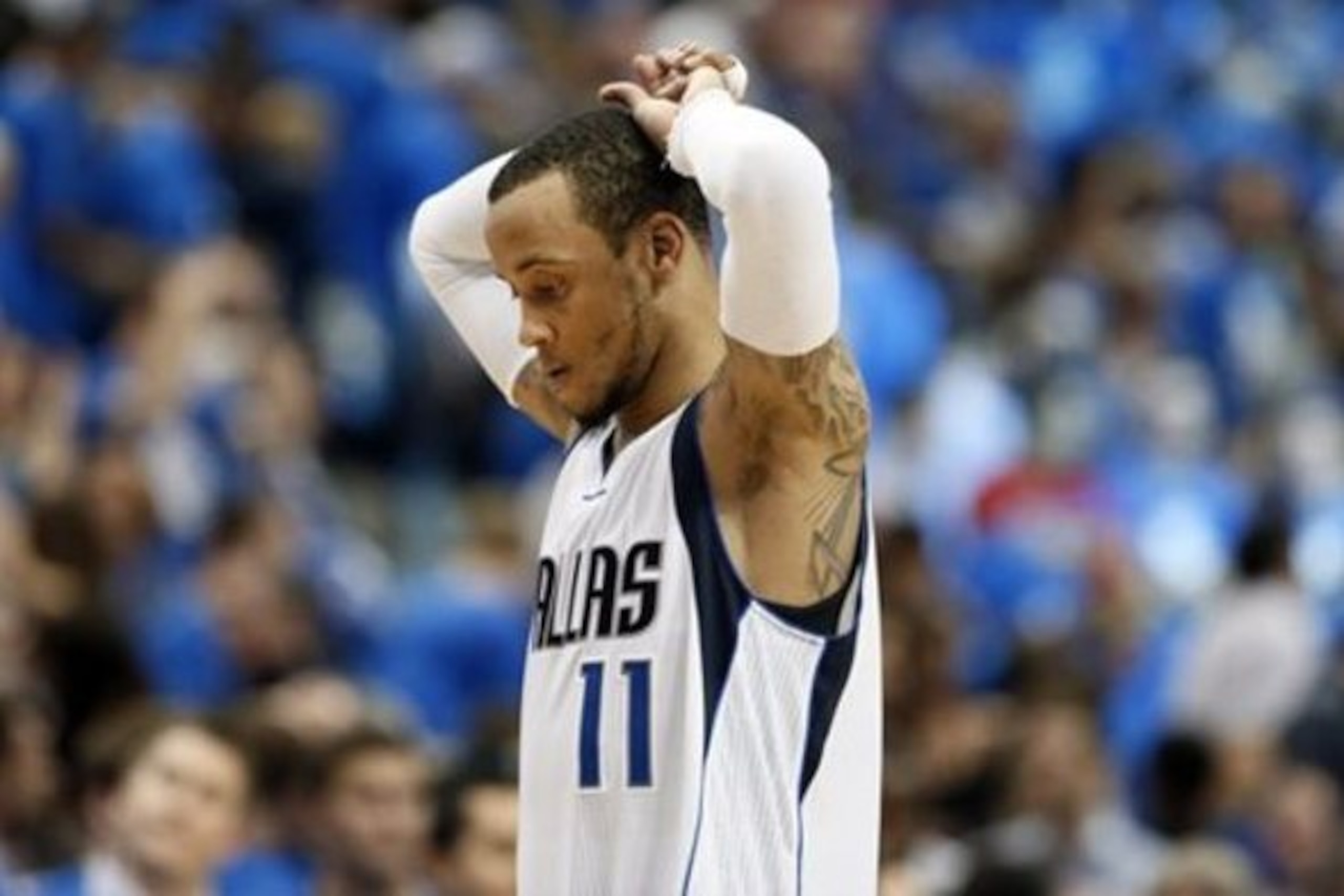 Dallas Mavericks' Monta Ellis (11) walks off the court after Game 3 in an NBA basketball first-round playoff series against the Houston Rockets, Friday, April 24, 2015, in Dallas. Ellis had 34-points in the 130-128 loss to the Rockets. (AP Photo/Tony Gutierrez)
