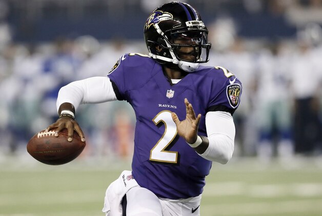 Baltimore Ravens quarterback Tyrod Taylor (2) looks for a receiver during the second half of an NFL preseason football game against the Dallas Cowboys, Saturday, Aug. 16, 2014, in Arlington, Texas. (AP Photo/Brandon Wade)