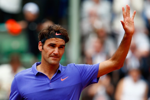 PARIS, FRANCE - MAY 24:  Roger Federer of Switzerland celebrates match point after his Men's Singles match against Alejandro Falla of Colombia on day one of the 2015 French Open at Roland Garros on May 24, 2015 in Paris, France.  (Photo by Julian Finney/Getty Images)