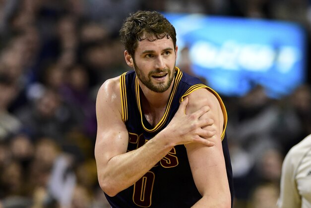Apr 26, 2015; Boston, MA, USA; Cleveland Cavaliers forward Kevin Love (0) injures his shoulder during the first half in game four of the first round of the NBA Playoffs against the Boston Celtics. at TD Garden. Mandatory Credit: Bob DeChiara-USA TODAY Sports