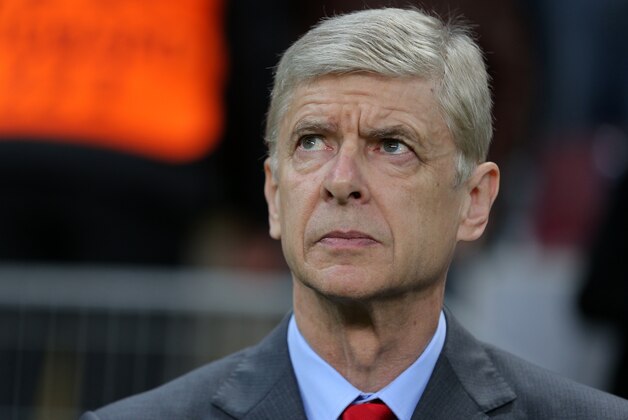 Arsenal's coach Arsene Wenger watches the game during their Champions League Group D soccer match with Galatasaray at the Turk Telekom Arena Stadium in Istanbul, Turkey, Tuesday, Dec. 9, 2014. (AP Photo)