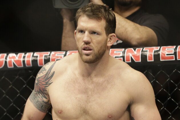 Ryan Bader stands in the ring before fighting with Vladimir Matyushenko during UFC Light Heavyweight Championship on FOX 6 at the United Center in Chicago, Saturday, Jan. 26, 2013. Bader won the bout. (AP Photo/Nam Y. Huh)