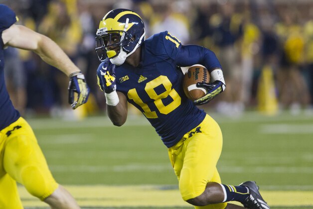 Michigan defensive back Blake Countess (18) intercepts a Notre Dame pass in the second quarter of an NCAA college football game, in Ann Arbor, Mich., Saturday, Sept. 7, 2013. (AP Photo/Tony Ding)