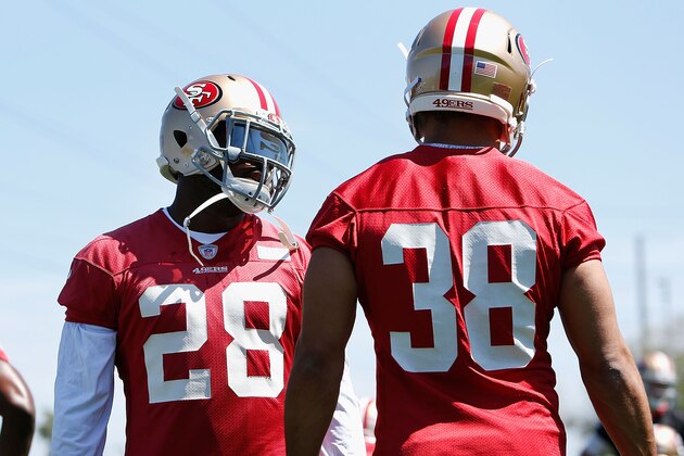 SANTA CLARA, CA - APRIL 29:  Jarryd Hayne #38 of the San Francisco 49ers speaks to Carlos Hyde #28 of the San Francisco 49ers during a media opportunity at Levi's Stadium on April 29, 2015 in Santa Clara, California.  (Photo by Lachlan Cunningham/Getty Images)