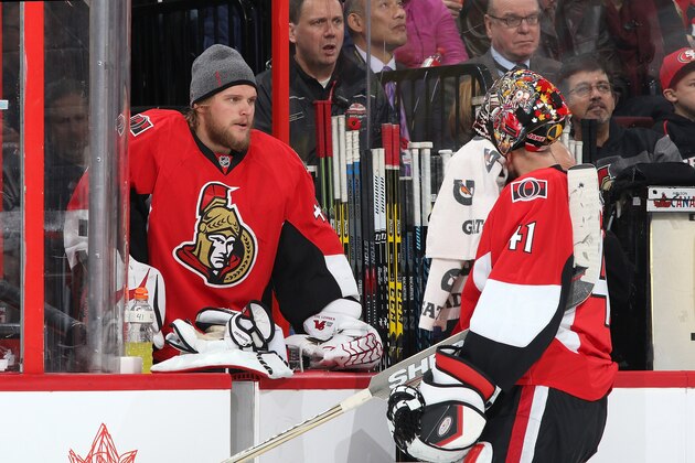 OTTAWA, ON - NOVEMBER 8: Robin Lehner #40 of the Ottawa Senators (L) chats with Craig Anderson #41 in a second period TV timeout during an NHL game against the Winnipeg Jets at Canadian Tire Centre on November 8, 2014 in Ottawa, Ontario, Canada.  (Photo by Jana Chytilova/Freestyle Photography/Getty Images)