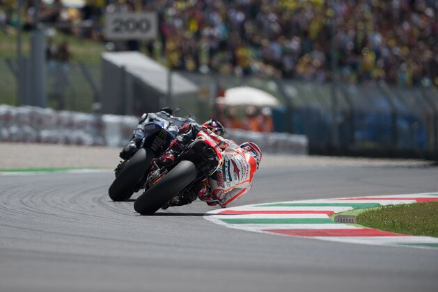 SCARPERIA, ITALY - JUNE 01:  Jorge Lorenzo of Spain and Movistar Yamaha MotoGP
 leads Marc Marquez of Spain and Repsol Honda Team during the MotoGP race during the MotoGp of Italy - Race at Mugello Circuit on June 1, 2014 in Scarperia, Italy.  (Photo by Mirco Lazzari gp/Getty Images)