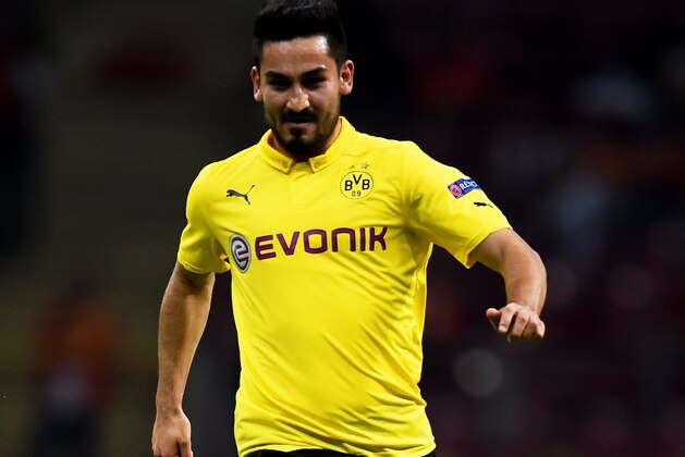 ISTANBUL, TURKEY - OCTOBER 22: Ilkay Gundogan of Borussia Dortmund runs with the ball during UEFA Champions League Group D match between Galatasaray and Borussia Dortmund at Turk Telekom Arena on October 22, 2014 in Istanbul, Turkey. (Photo by Lars Baron/Getty Images) ISTANBUL, TURKEY - OCTOBER 22: Ilkay Gundogan of Borussia Dortmund runs with the ball during UEFA Champions League Group D match between Galatasaray and Borussia Dortmund at Turk Telekom Arena on October 22, 2014 in Istanbul, Turkey. (Photo by Lars Baron/Getty Images)