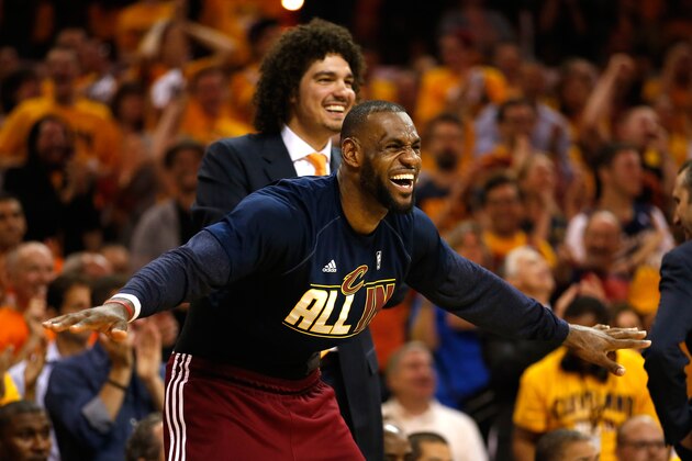 CLEVELAND, OH - MAY 26: LeBron James #23 and Anderson Varejao #17 of the Cleveland Cavaliers react on the bench in the fourth quarter against the Atlanta Hawks during Game Four of the Eastern Conference Finals of the 2015 NBA Playoffs at Quicken Loans Arena on May 26, 2015 in Cleveland, Ohio. NOTE TO USER: User expressly acknowledges and agrees that, by downloading and or using this Photograph, user is consenting to the terms and conditions of the Getty Images License Agreement.  (Photo by Gregory Shamus/Getty Images)