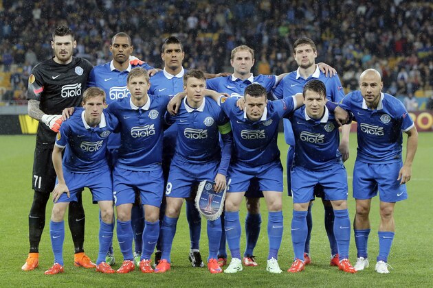 Dnipro players pose for a  photo prior to the Europa League  semifinal, second leg, soccer match between Napoli and Dnipro at Olimpiyskiy Stadium in Kiev, Ukraine, Thursday, May 14, 2015. (AP Photo/Efrem Lukatsky)