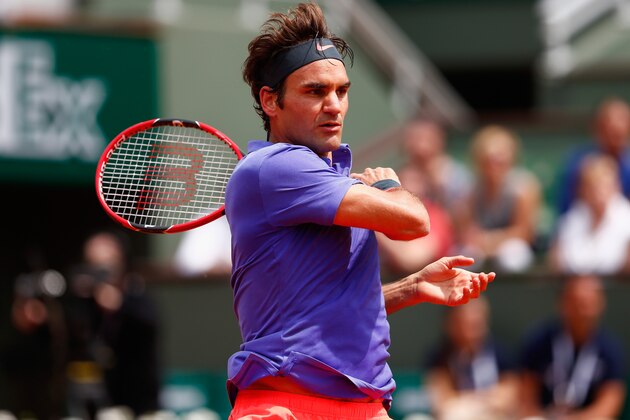 PARIS, FRANCE - MAY 24:  Roger Federer of Switzerland plays a forehand during his Men's Singles match against Alejandro Falla of Colombia on day one of the 2015 French Open at Roland Garros on May 24, 2015 in Paris, France.  (Photo by Julian Finney/Getty Images)