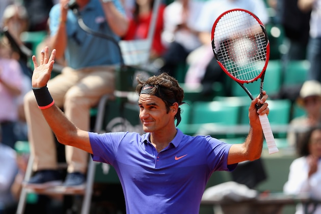 PARIS, FRANCE - MAY 27:  Roger Federer of Switzerland celebrates victory in his Men's Singles match against Marcel Granollers of Spain during day four of the 2015 French Open at Roland Garros on May 27, 2015 in Paris, France.  (Photo by Clive Mason/Getty Images)