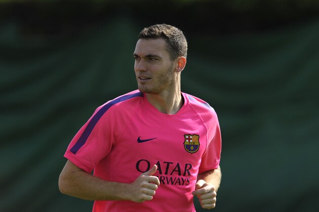 FC Barcelona's Belgian Thomas Vermaelen attends a training session at the Sports Center FC Barcelona Joan Gamper in San Joan Despi, Spain, Saturday, Aug. 23, 2014. (AP Photo/Manu Fernandez)