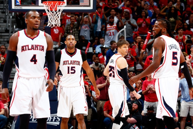 ATLANTA, GA - MAY 03:  Paul Millsap #4, Al Horford #15, Kyle Korver #26, and DeMarre Carroll #5 of the Atlanta Hawks get back on defense against the Washington Wizards during Game One of the Eastern Conference Semifinals of the 2015 NBA Playoffs at Philips Arena on May 3, 2015 in Atlanta, Georgia.  NOTE TO USER: User expressly acknowledges and agrees that, by downloading and/or using this photograph, user is consenting to the terms and conditions of the Getty Images License Agreement.  (Photo by Kevin C. Cox/Getty Images)