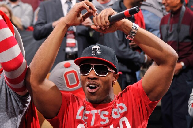 COLUMBUS, OH - FEBRUARY 10:  Rapper Mekka Don, right, performs for the crowd before the game between the Ohio State Buckeyes and the Indiana Hoosiers on February 10, 2013 at Value City Arena in Columbus, Ohio.  (Photo by Jamie Sabau/Getty Images)