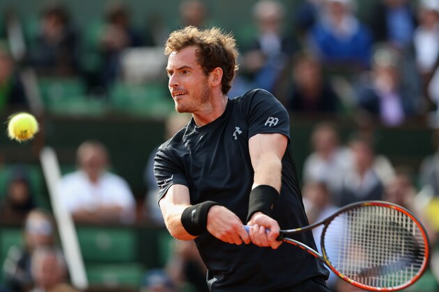 PARIS, FRANCE - MAY 25:  Andy Murray of Great Britain plays a backhand in his Men's Singles match against  Facundo Arguello of Argentina on day two of the 2015 French Open at Roland Garros on May 25, 2015 in Paris, France.  (Photo by Clive Mason/Getty Images)