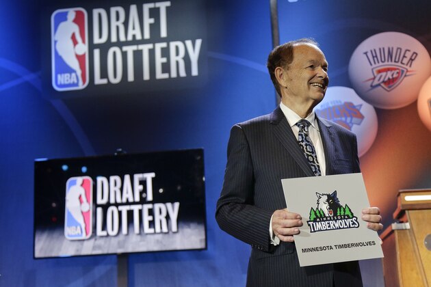 Minnesota Timberwolves owner Glen Miller poses for photos after the Timberwolves won the No. 1 pick in the NBA basketball draft lottery Tuesday, May 19, 2015, in New York. (AP Photo/Julie Jacobson)