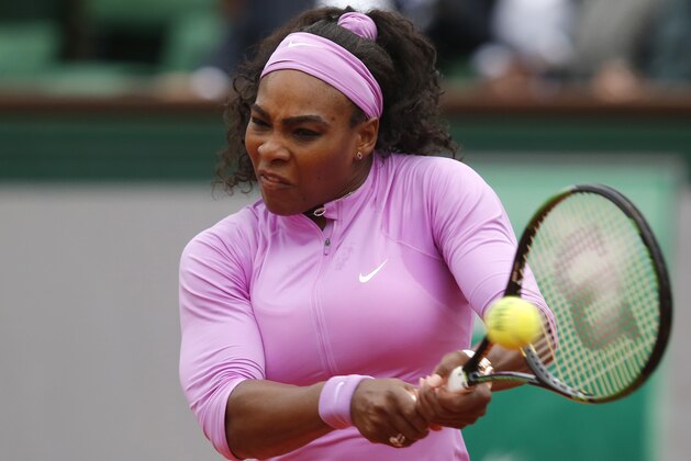 Serena Williams of the U.S. returns in the first round match of the French Open tennis tournament against Andrea Hlavackova of the Czech Republic at the Roland Garros stadium, in Paris, France, Tuesday, May 26, 2015. (AP Photo/Michel Euler)