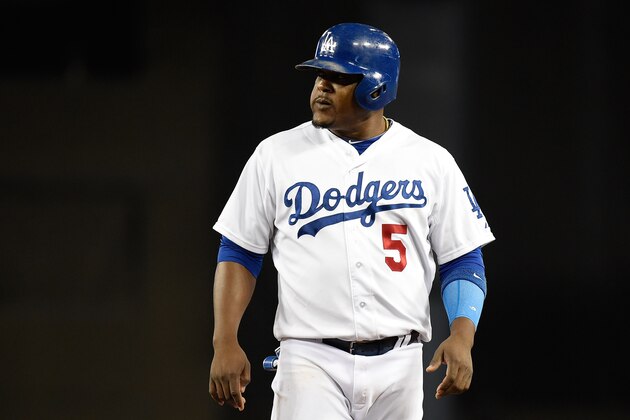LOS ANGELES, CA - JULY 30:  Juan Uribe #5 of the Los Angeles Dodgers waits at first base after hitting a RBI single in the eighth inning against the Atlanta Braves at Dodger Stadium on July 30, 2014 in Los Angeles, California.  (Photo by Lisa Blumenfeld/Getty Images)