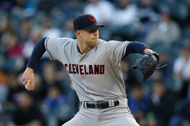 Cleveland Indians starting pitcher Corey Kluber delivers against the Chicago White Sox during the first inning of a baseball game Monday, May 18, 2015, in Chicago. (AP Photo/Andrew A. Nelles)
