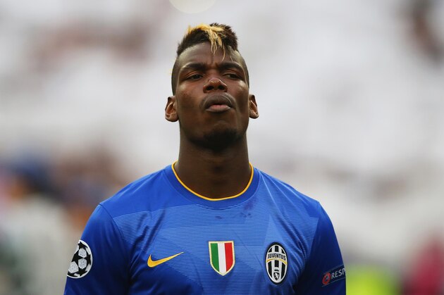 MADRID, SPAIN - MAY 13:  Paul Pogba of Juventus looks on prior to kickoff during the UEFA Champions League Semi Final, second leg match between Real Madrid and Juventus at Estadio Santiago Bernabeu on May 13, 2015 in Madrid, Spain.  (Photo by Alex Livesey/Getty Images)