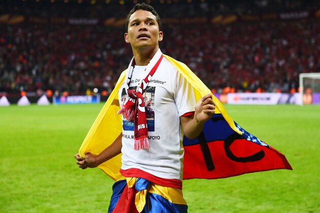 WARSAW, POLAND - MAY 27:  Carlos Bacca of Sevilla celebrates victory after the UEFA Europa League Final match between FC Dnipro Dnipropetrovsk and FC Sevilla on May 27, 2015 in Warsaw, Poland.  (Photo by Shaun Botterill/Getty Images)