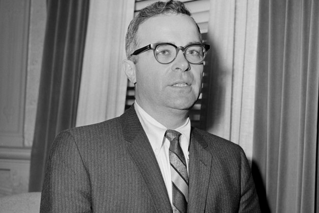 Walter Byers, executive director of the NCAA, is shown at a football meeting at the Astor Hotel in New York, Jan. 8, 1960. (AP Photo/John Rooney)
