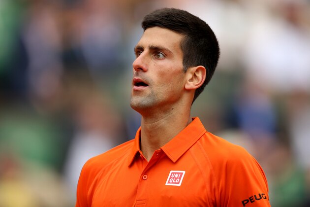 PARIS, FRANCE - MAY 26:  Novak Djokovic of Serbia looks on in his Men's Singles match against Jarkko Nieminen of Finland on day three of the 2015 French Open at Roland Garros on May 26, 2015 in Paris, France.  (Photo by Clive Brunskill/Getty Images)