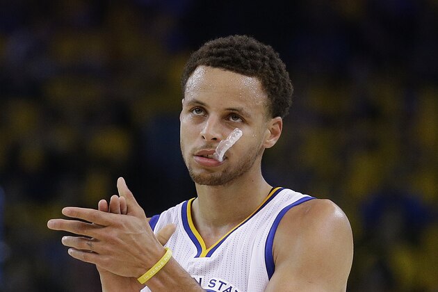 Golden State Warriors guard Stephen Curry (30) against the Houston Rockets during the first half of Game 5 of the NBA basketball Western Conference finals in Oakland, Calif., Wednesday, May 27, 2015. (AP Photo/Ben Margot)
