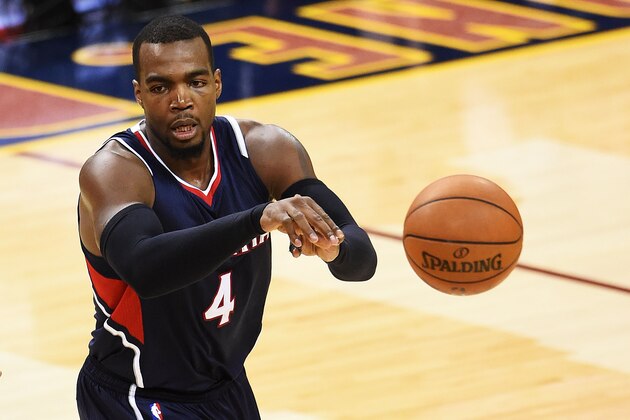 CLEVELAND, OH - MAY 24:  Paul Millsap #4 of the Atlanta Hawks passes against the Cleveland Cavaliers in the third quarter during Game Three of the Eastern Conference Finals of the 2015 NBA Playoffs at Quicken Loans Arena on May 24, 2015 in Cleveland, Ohio. NOTE TO USER: User expressly acknowledges and agrees that, by downloading and or using this Photograph, user is consenting to the terms and conditions of the Getty Images License Agreement.  (Photo by Jason Miller/Getty Images)