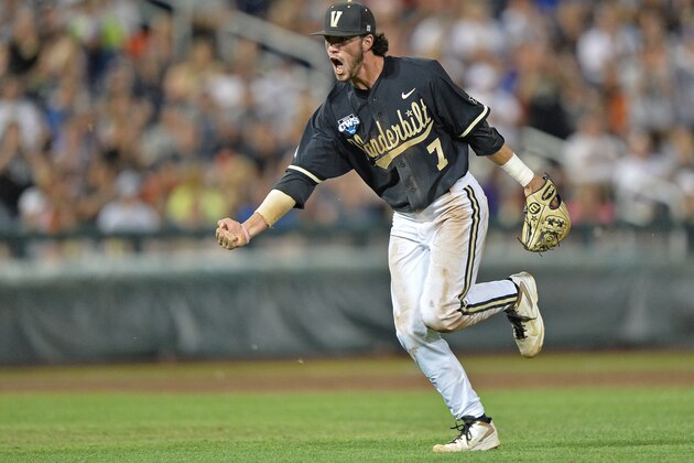 Omaha, NE - JUNE 25: Second basemen Dansby Swanson #7 of the Vanderbilt Commodores celebrates after recording the final out of the eighth inning against the Virginia Cavaliers during game three of the College World Series Championship Series on June 25, 2014 at TD Ameritrade Park in Omaha, Nebraska. (Photo by Peter Aiken/Getty Images) Omaha, NE - JUNE 25: Second basemen Dansby Swanson #7 of the Vanderbilt Commodores celebrates after recording the final out of the eighth inning against the Virginia Cavaliers during game three of the College World Series Championship Series on June 25, 2014 at TD Ameritrade Park in Omaha, Nebraska. (Photo by Peter Aiken/Getty Images)