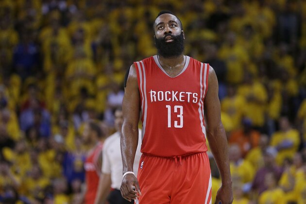 Houston Rockets guard James Harden (13) walks on the floor during the second half of Game 5 of the NBA basketball Western Conference finals against the Golden State Warriors in Oakland, Calif., Wednesday, May 27, 2015. (AP Photo/Ben Margot)