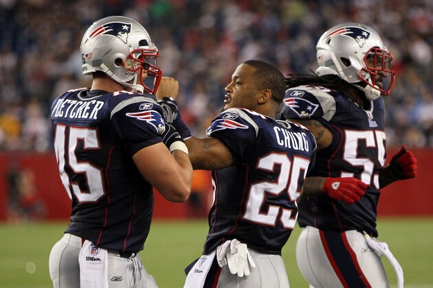 FOXBORO, MA - AUGUST 12: Patrick Chung # 25 greets Dane Fletcher # 45 and Brandon Spikes # 55 of the New England Patriots during the second half of a preseason game against the New Orleans Saints at Gillette Stadium on August 12, 2010 in Foxboro, Massachusetts. (Photo by Jim Rogash/Getty Images)