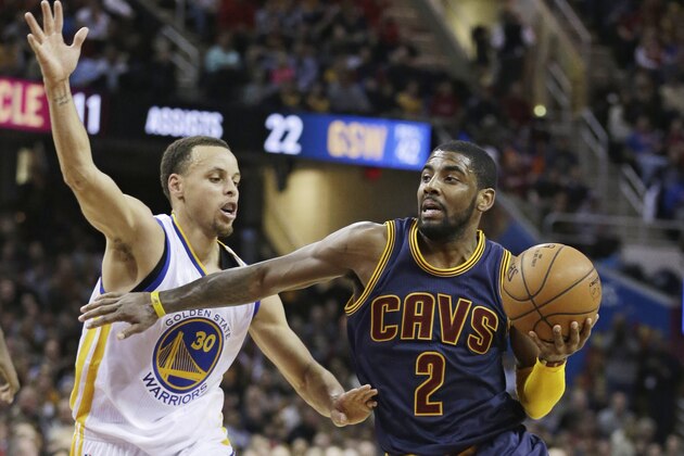 Cleveland Cavaliers' Kyrie Irving (2) drives past Golden State Warriors’ Stephen Curry (30) during the third quarter of an NBA basketball game Thursday, Feb. 26, 2015, in Cleveland. The Cavaliers defeated the Warriors 110-99. (AP Photo/Tony Dejak) Cleveland Cavaliers' Kyrie Irving (2) drives past Golden State Warriors’ Stephen Curry (30) during the third quarter of an NBA basketball game Thursday, Feb. 26, 2015, in Cleveland. The Cavaliers defeated the Warriors 110-99. (AP Photo/Tony Dejak)