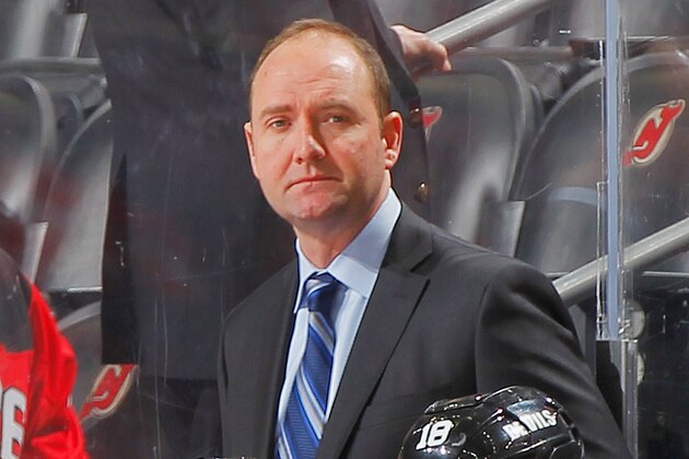 NEWARK, NJ - FEBRUARY 03: Head coach Peter DeBoer of the New Jersey Devils looks on during a first period timeout against the Colorado Avalanche at the Prudential Center on February 3, 2014 in Newark, New Jersey. (Photo by Andy Marlin/NHLI via Getty Images)