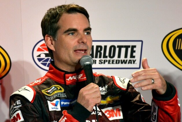 Jeff Gordon answers media in Charlotte.