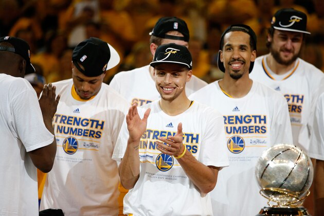 OAKLAND, CA - MAY 27:  Stephen Curry #30 of the Golden State Warriors celebrates the Warriors 104-90 victory against the Houston Rockets during game five of the Western Conference Finals of the 2015 NBA Playoffs at ORACLE Arena on May 27, 2015 in Oakland, California. NOTE TO USER: User expressly acknowledges and agrees that, by downloading and or using this photograph, user is consenting to the terms and conditions of Getty Images License Agreement.  (Photo by Ezra Shaw/Getty Images)