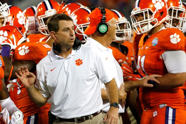 ORLANDO, FL - DECEMBER 29:  Head coach Dabo Swinney of the Clemson Tigers speaks to his team during the Russell Athletic Bowl against the Oklahoma Sooners the at the Florida Citrus Bowl on December 29, 2014 in Orlando, Florida. The Clemson Tigers defeated the Oklahoma Sooners 40-6.  (Photo by Sam Greenwood/Getty Images)