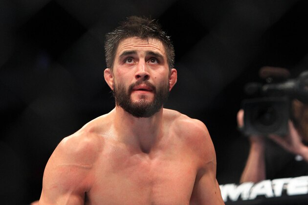 Aug 28, 2013; Indianapolis, IN, USA; Carlos Condit celebrates after beating Martin Kampmann during UFC Fight NIght 27 at Bankers Life Fieldhouse. Mandatory Credit: Pat Lovell-USA TODAY Sports