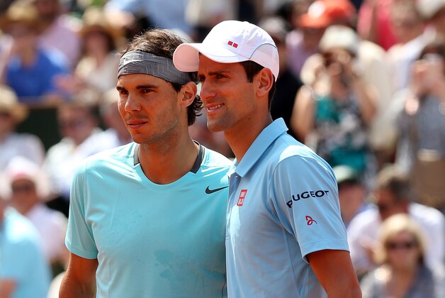 PARIS, FRANCE - JUNE 08:  Novak Djokovic of Serbia poses with Rafael Nadal of Spain before their men's singles final match on day fifteen of the French Open at Roland Garros on June 8, 2014 in Paris, France.  (Photo by Matthew Stockman/Getty Images)