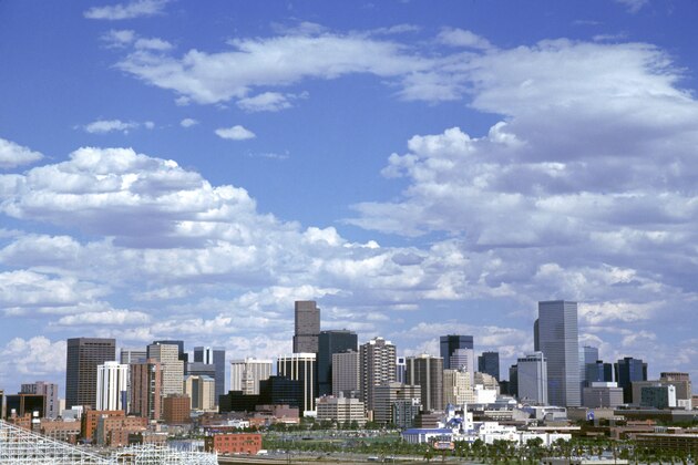 DENVER - SEPTEMBER 4:  The city of Denver skyline viewed from Mile High Stadium prior to a game between the Denver Broncos and the San Diego Chargers at Mile High Stadium on September 4, 1994 in Denver, Colorado.  The Chargers won 37-34.  (Photo by George Rose/Getty Images)
