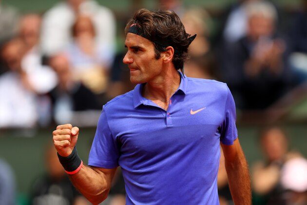 PARIS, FRANCE - MAY 29:  Roger Federer of Switzerland celebrates a point in his Men's Singles match against Damir Dzumhur of Bosnia and Herzegovina on day six of the 2015 French Open at Roland Garros on May 29, 2015 in Paris, France.  (Photo by Clive Brunskill/Getty Images)