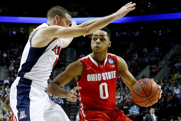 PORTLAND, OR - MARCH 21:  D'Angelo Russell #0 of the Ohio State Buckeyes drives against T.J. McConnell #4 of the Arizona Wildcats in the second half during the third round of the 2015 NCAA Men's Basketball Tournament at Moda Center on March 21, 2015 in Portland, Oregon.  (Photo by Jonathan Ferrey/Getty Images)