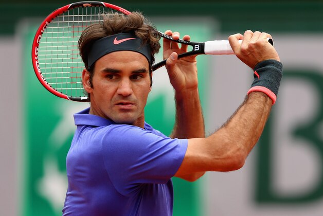 PARIS, FRANCE - MAY 29:  Roger Federer of Switzerland in action in his Men's Singles match against Damir Dzumhur of Bosnia and Herzegovina on day six of the 2015 French Open at Roland Garros on May 29, 2015 in Paris, France.  (Photo by Clive Brunskill/Getty Images)