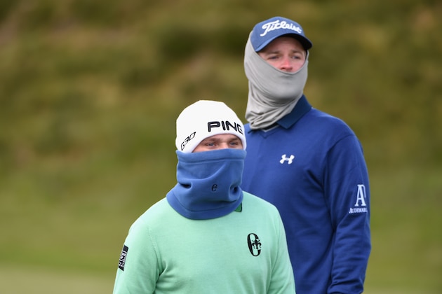 NEWCASTLE, NORTHERN IRELAND - MAY 29:  Bernd Wiesberger of Austria  (R) and Andy Sullivan of England look down the 13th hole during the Second Round of the Dubai Duty Free Irish Open Hosted by the Rory Foundation at Royal County Down Golf Club on May 29, 2015 in Newcastle, Northern Ireland.  (Photo by Ross Kinnaird/Getty Images)