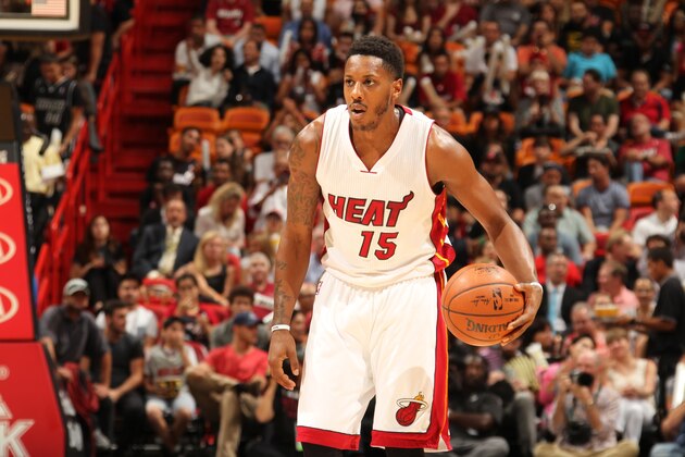 MIAMI, FL - APRIL 13:  Mario Chalmers #15 of the Miami Heat brings the ball up court against the Orlando Magic on April 13, 2015 at American Airlines Arena in Miami, Florida.  NOTE TO USER: User expressly acknowledges and agrees that, by downloading and or using this Photograph, user is consenting to the terms and conditions of the Getty Images License Agreement. Mandatory Copyright Notice: Copyright 2015 NBAE (Photo by Issac Baldizon/NBAE via Getty Images)